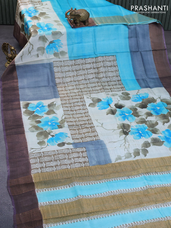 Pure tussar silk saree light blue and beige violet with hand painted prints and zari woven border