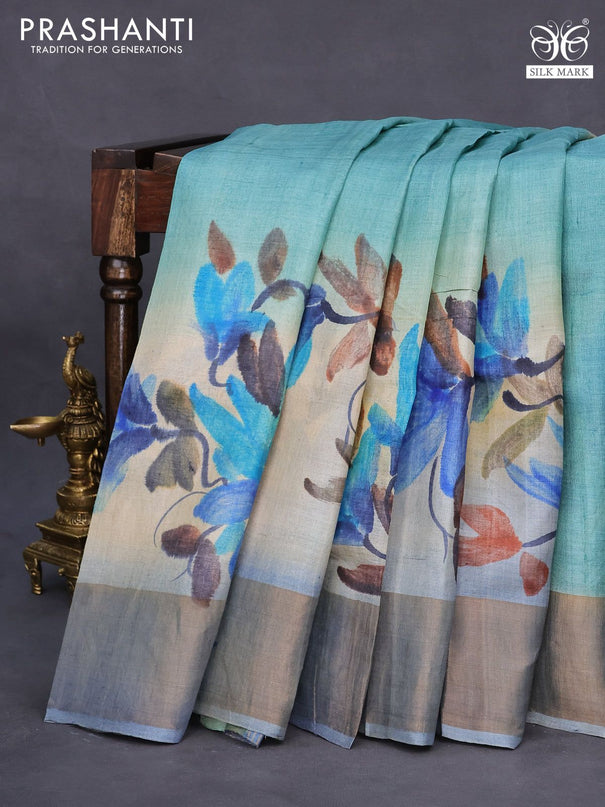 Pure tussar silk saree teal blue shade and greyish blue with floral design hand painted prints and zari woven border