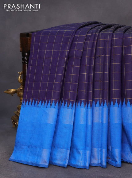 Pure dupion silk saree navy blue and cs blue with allover zari checked pattern and temple design zari woven rettapet border