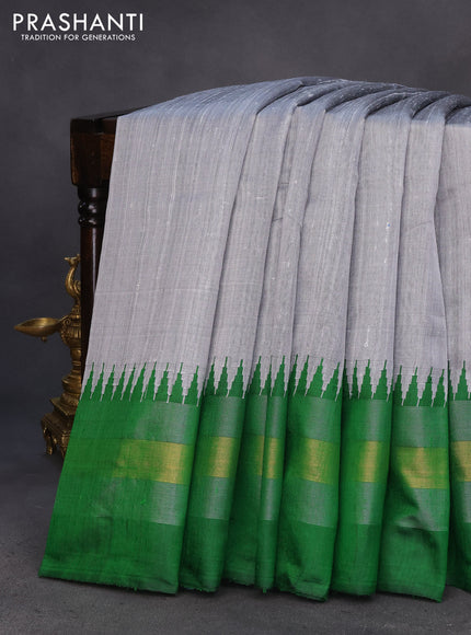 Pure dupion silk saree grey and green with plain body and temple design zari woven border