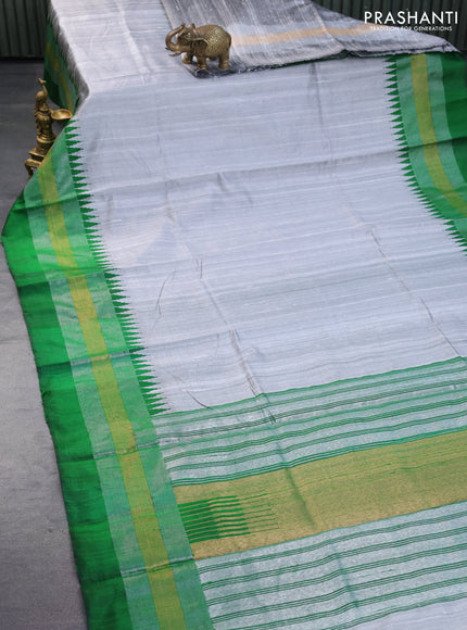 Pure dupion silk saree grey and green with plain body and temple design zari woven border