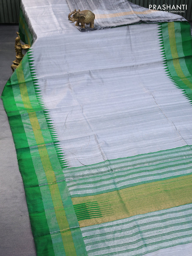 Pure dupion silk saree grey and green with plain body and temple design zari woven border