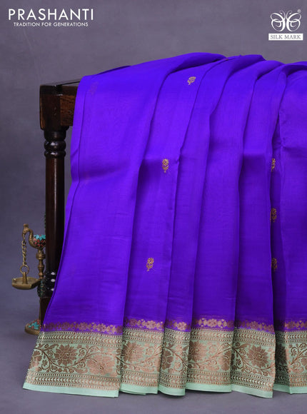 Banarasi organza silk saree royal blue and pastel green with thread & zari woven buttas and banarasi style border