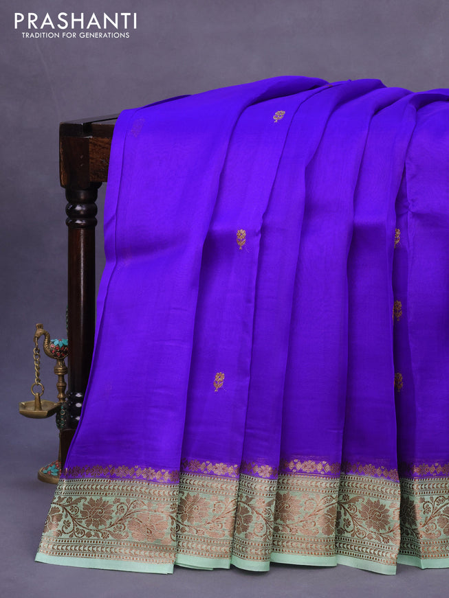 Banarasi organza silk saree royal blue and pastel green with thread & zari woven buttas and banarasi style border