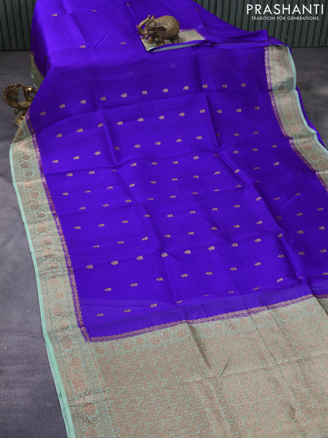 Banarasi organza silk saree royal blue and pastel green with thread & zari woven buttas and banarasi style border