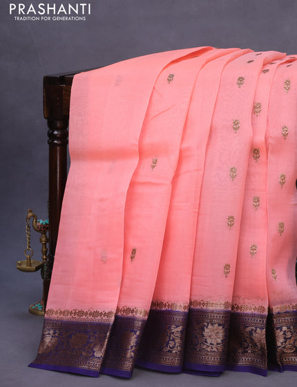 Banarasi organza silk saree peach pink and dark blue with thread & zari woven buttas and banarasi style border