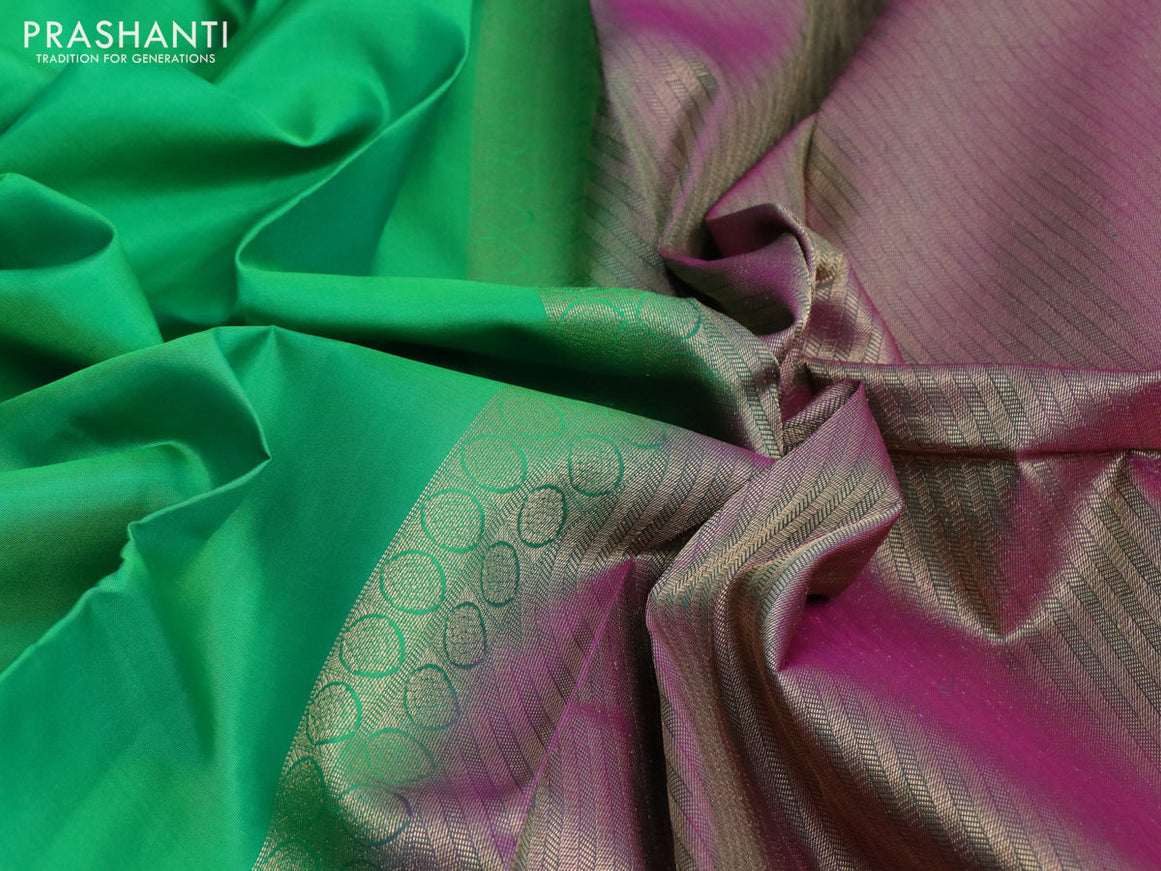 Pure kanchipuram silk saree green and dual shade of purple with plain body and zari woven simple border