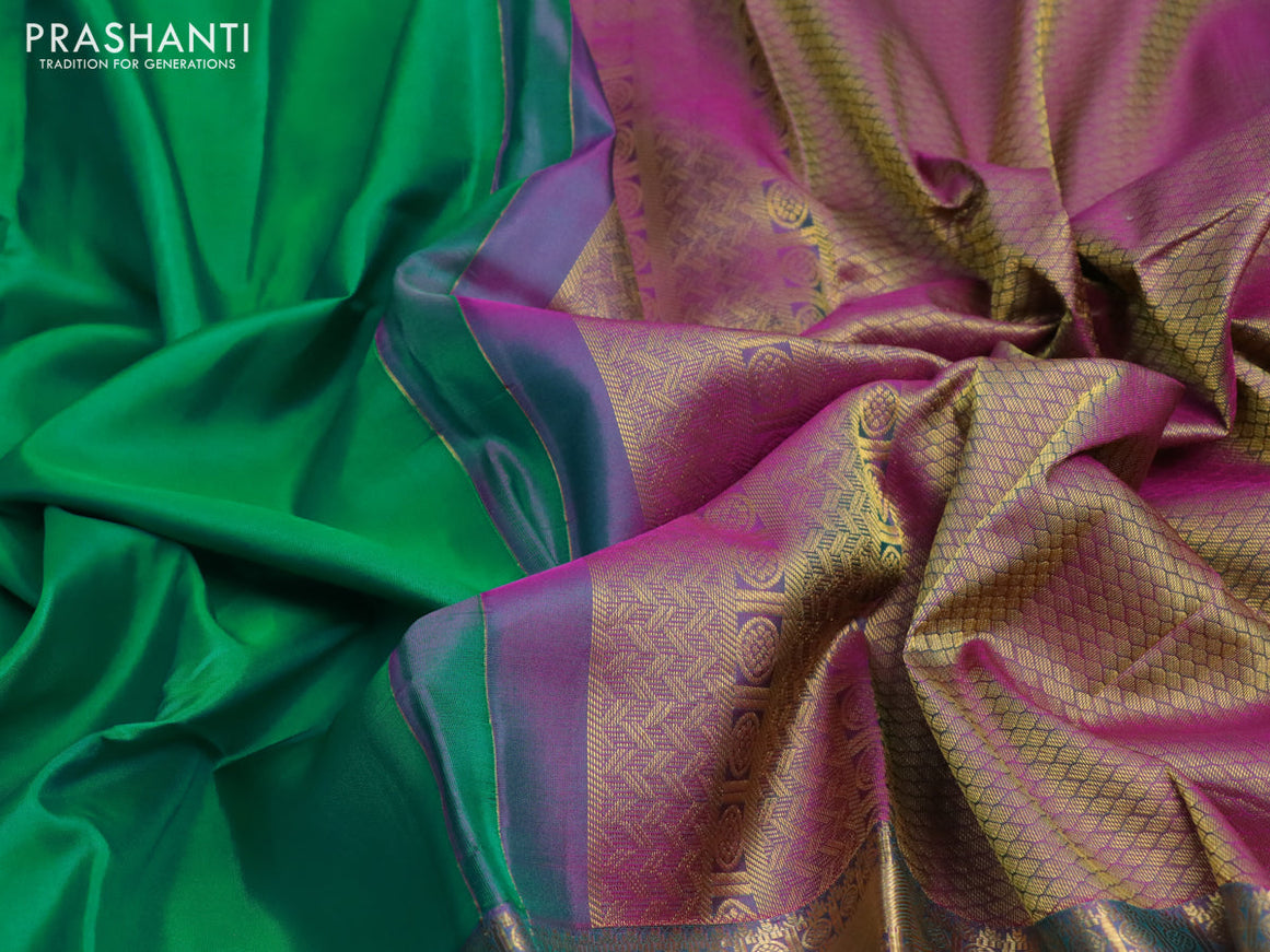 Pure kanchipuram silk saree dual shade of green and dual shade of purple with plain body and long zari woven simple border