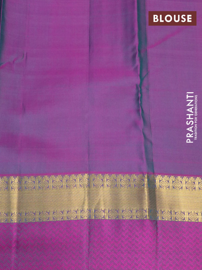 Pure kanchipuram silk saree dual shade of green and dual shade of purple with plain body and long zari woven simple border