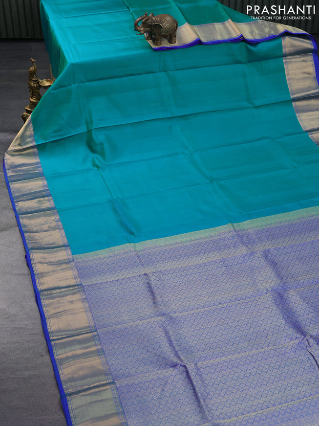 Pure kanchipuram silk saree teal blue and blue with plain body and zari woven border