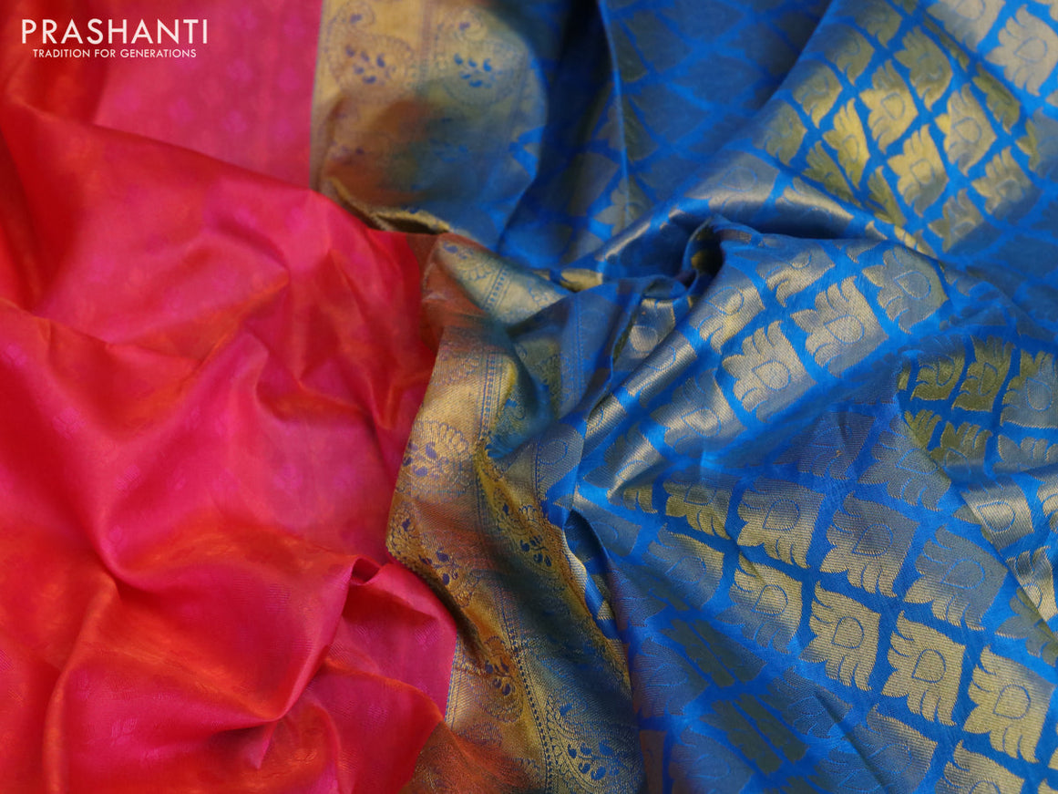 Pure kanchipuram silk saree dual shade of pinkish orange and cs blue with allover self emboss and zari woven border