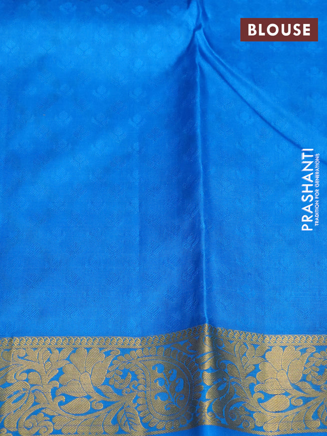 Pure kanchipuram silk saree dual shade of pinkish orange and cs blue with allover self emboss and zari woven border