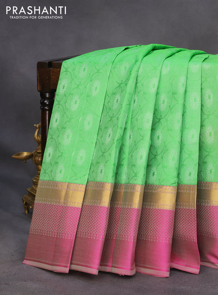 Pure kanchipuram silk saree light green and pink shade with allover self emboss and zari woven simple border