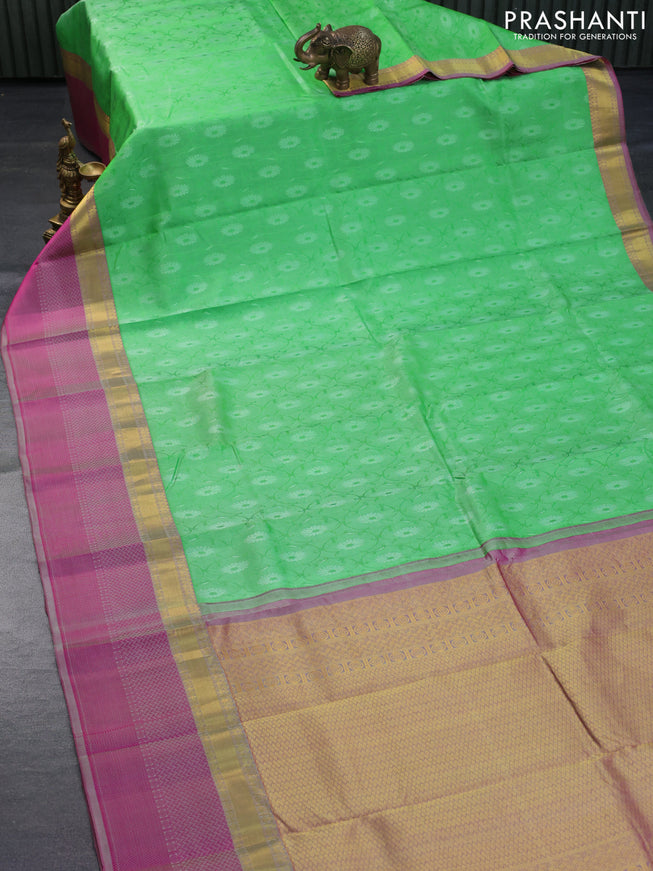 Pure kanchipuram silk saree light green and pink shade with allover self emboss and zari woven simple border