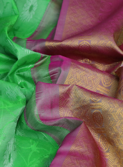 Pure kanchipuram silk saree light green and pink shade with allover self emboss and zari woven simple border