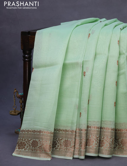 Banarasi organza silk saree pastel green shade with thread & zari woven buttas and banarasi style border