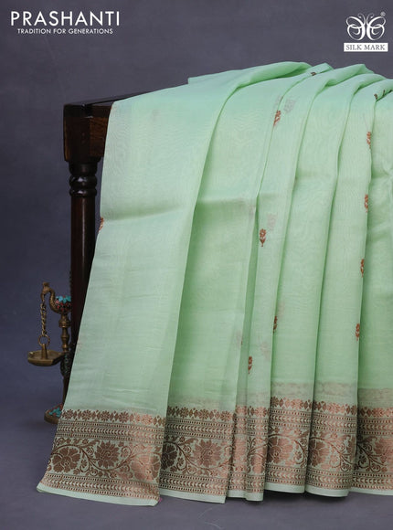 Banarasi organza silk saree pastel green shade with thread & zari woven buttas and banarasi style border