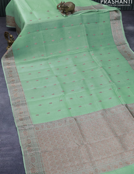 Banarasi organza silk saree pastel green shade with thread & zari woven buttas and banarasi style border