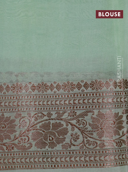 Banarasi organza silk saree pastel green shade with thread & zari woven buttas and banarasi style border