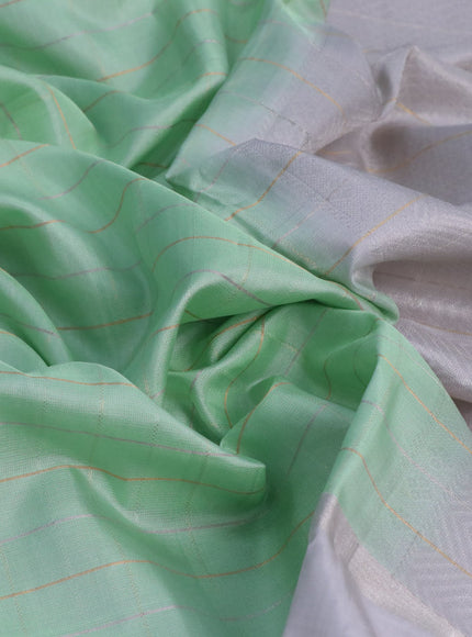 Pure soft silk saree pastel green and pastel grey with allover checked pattern and rettapet silver zari woven border