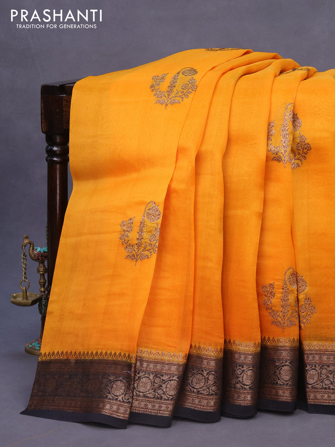 Banarasi organza silk saree orange and black with thread & zari woven buttas and banarasi style border