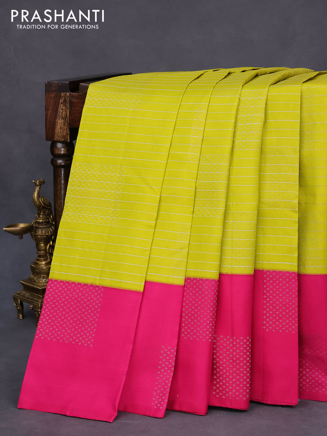 Pure soft silk saree lime yellow and pink with allover zari woven stripes pattern & buttas and zari woven butta border