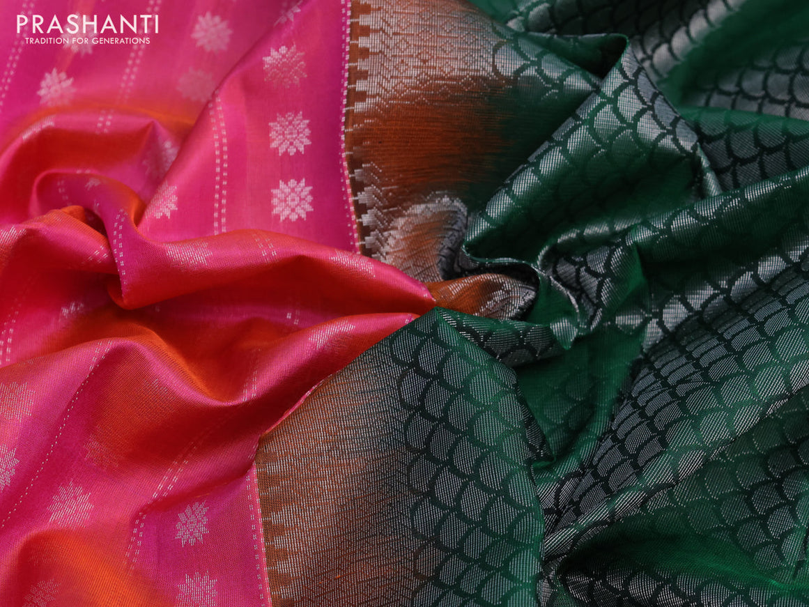 Pure soft silk saree dual shade of pinkish orange and green with allover silver zari woven butta weaves and long rich silver zari woven border