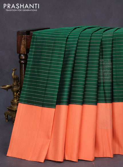 Pure soft silk saree green and peach orange with allover zari woven stripes pattern and zari woven butta border