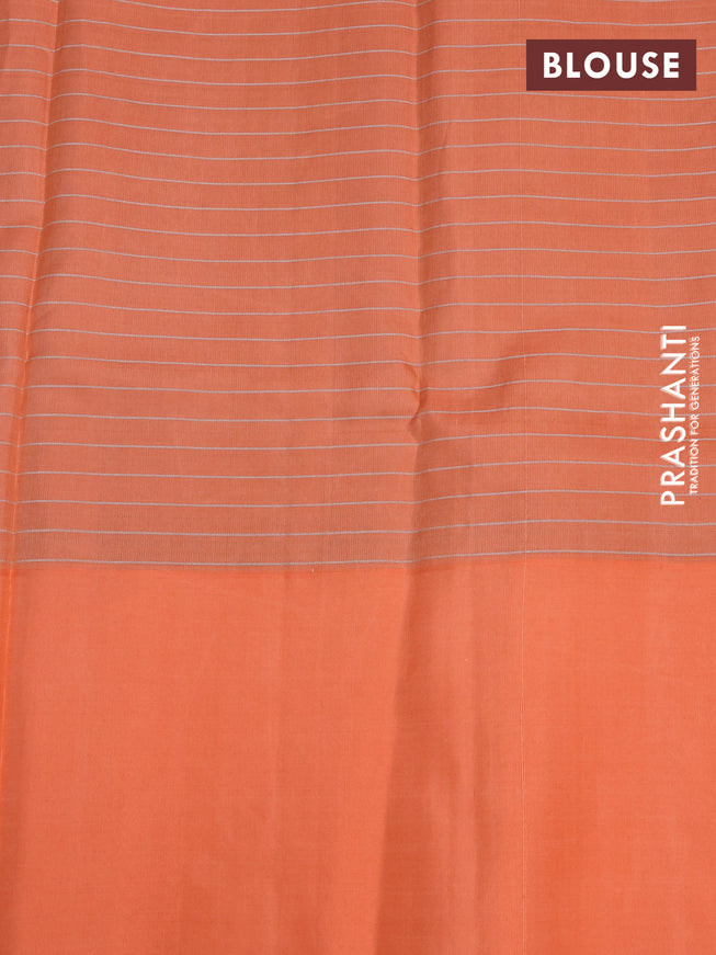 Pure soft silk saree green and peach orange with allover zari woven stripes pattern and zari woven butta border