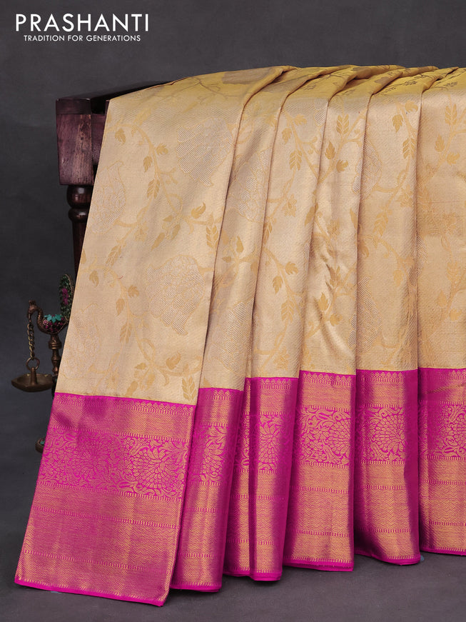 Pure kanchipuram tissue silk saree sandal and pink with allover zari woven brocade weaves and long zari woven border