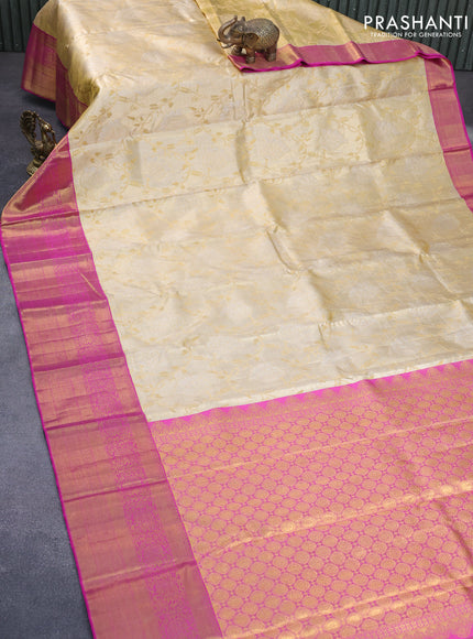 Pure kanchipuram tissue silk saree sandal and pink with allover zari woven brocade weaves and long zari woven border