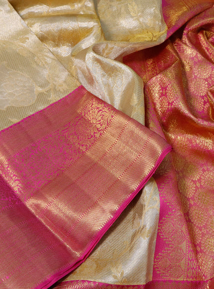 Pure kanchipuram tissue silk saree sandal and pink with allover zari woven brocade weaves and long zari woven border