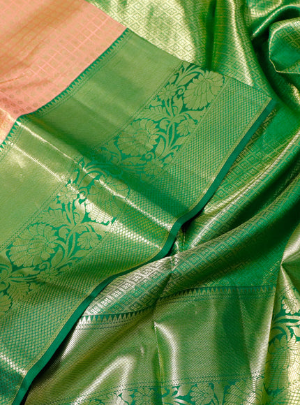 Pure kanchipuram tissue silk saree peach shade and green with allover zari checked pattern and zari woven border