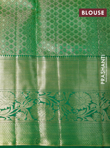 Pure kanchipuram tissue silk saree peach shade and green with allover zari checked pattern and zari woven border