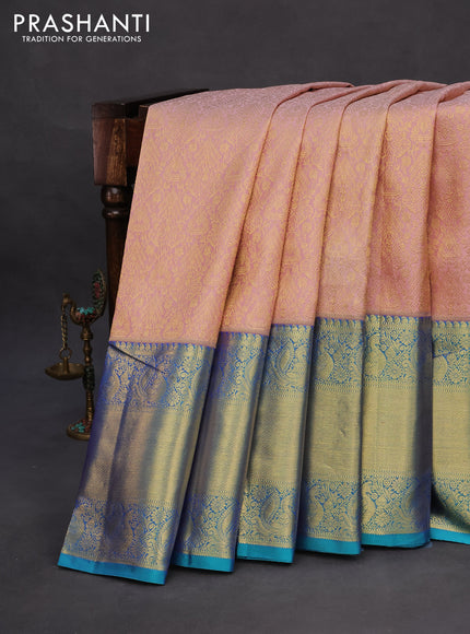 Pure kanchipuram silk saree pastel pink and teal blue with allover zari woven brocade weaves and long zari woven border