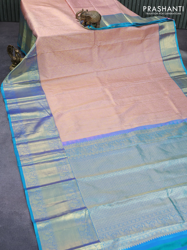 Pure kanchipuram silk saree pastel pink and teal blue with allover zari woven brocade weaves and long zari woven border