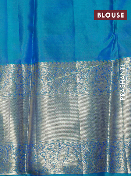 Pure kanchipuram silk saree pastel pink and teal blue with allover zari woven brocade weaves and long zari woven border