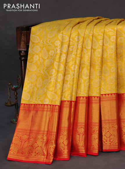 Pure kanchipuram tissue silk saree yellow and red with allover zari woven brocade weaves and long zari woven border