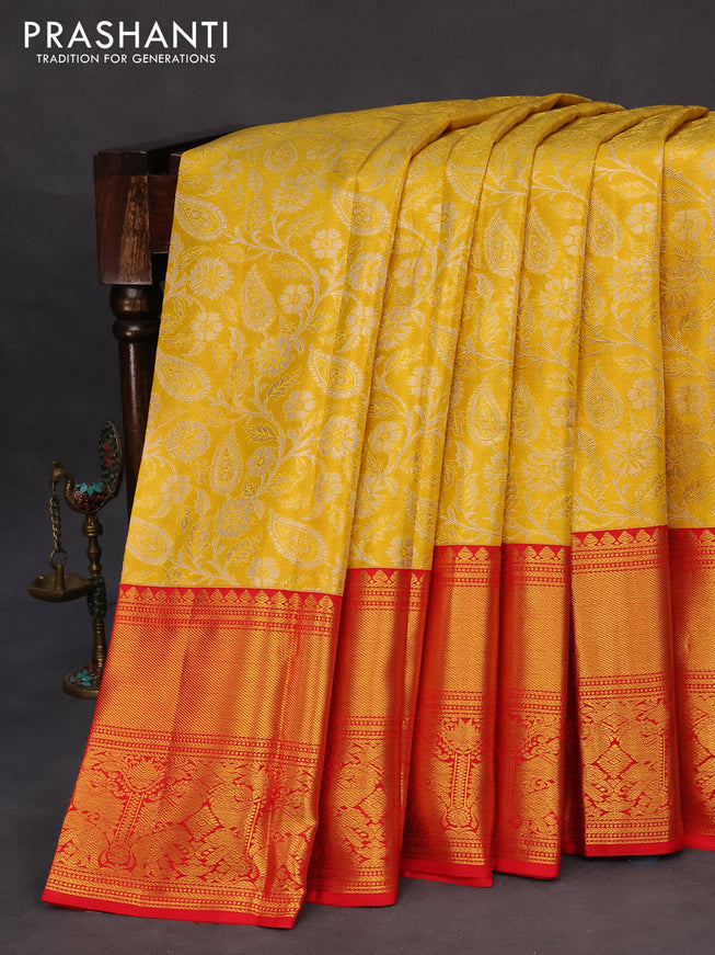 Pure kanchipuram tissue silk saree yellow and red with allover zari woven brocade weaves and long zari woven border