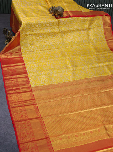 Pure kanchipuram tissue silk saree yellow and red with allover zari woven brocade weaves and long zari woven border