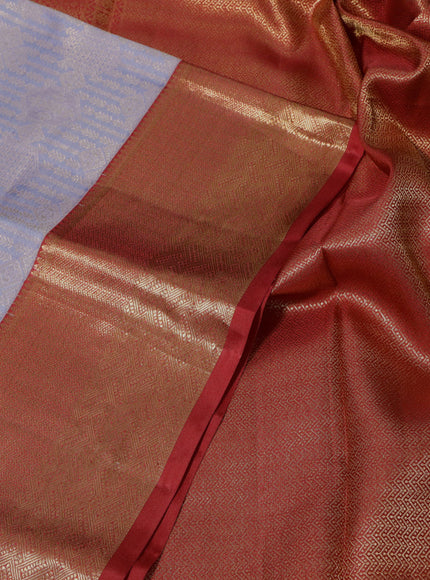 Pure kanchipuram silk saree pastel blue shade and red with allover zari woven brocade weaves and zari woven border