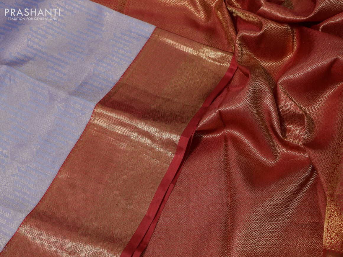 Pure kanchipuram silk saree pastel blue shade and red with allover zari woven brocade weaves and zari woven border