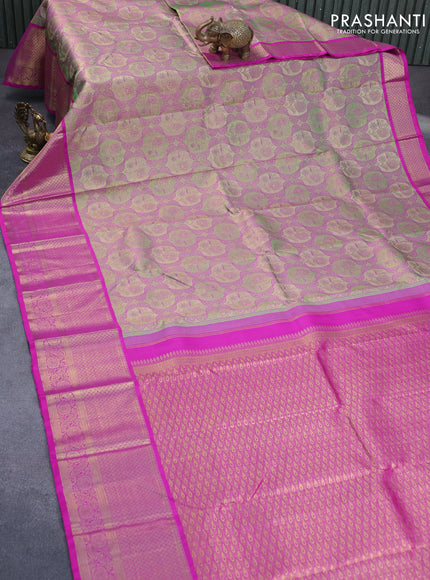 Pure kanchipuram tissue silk saree multi colour and magenta pink with allover zari woven brocade weaves and long zari woven border