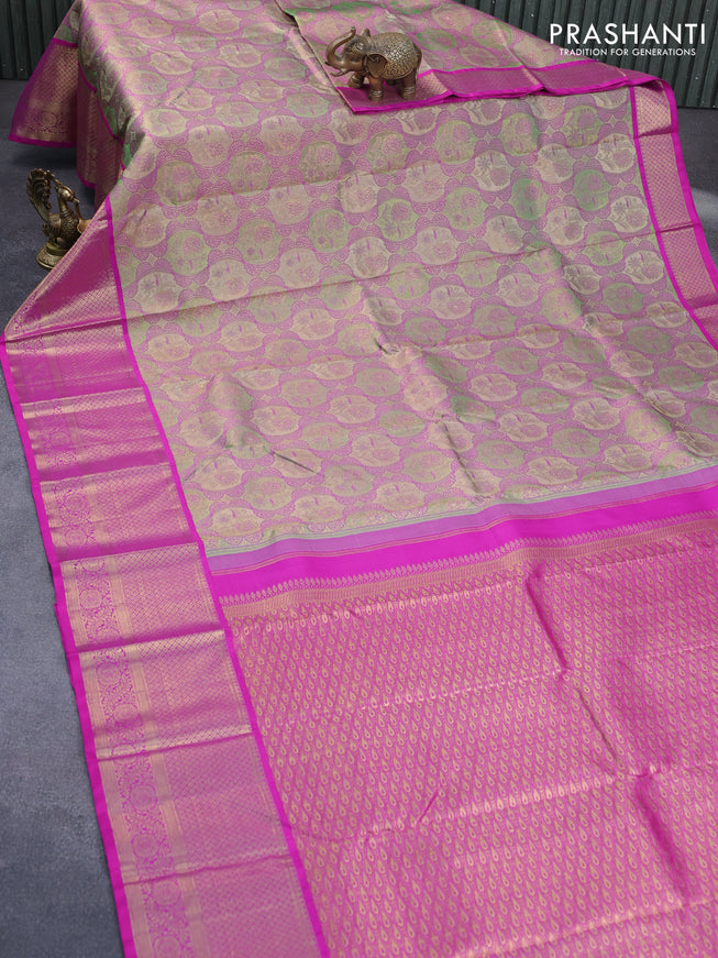 Pure kanchipuram tissue silk saree multi colour and magenta pink with allover zari woven brocade weaves and long zari woven border