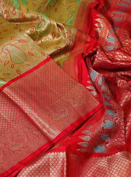 Pure kanchipuram tissue silk saree gold and red with allover zari woven brocade weaves and long zari woven border