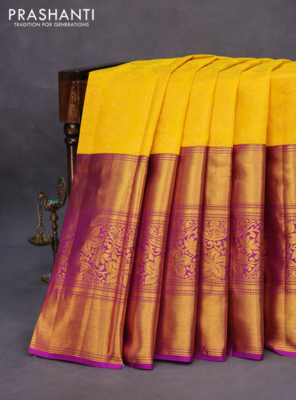 Pure kanchipuram silk saree yellow and purple with allover zari woven brocade weaves and long zari woven border