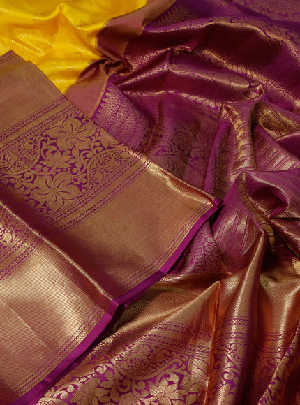 Pure kanchipuram silk saree yellow and purple with allover zari woven brocade weaves and long zari woven border