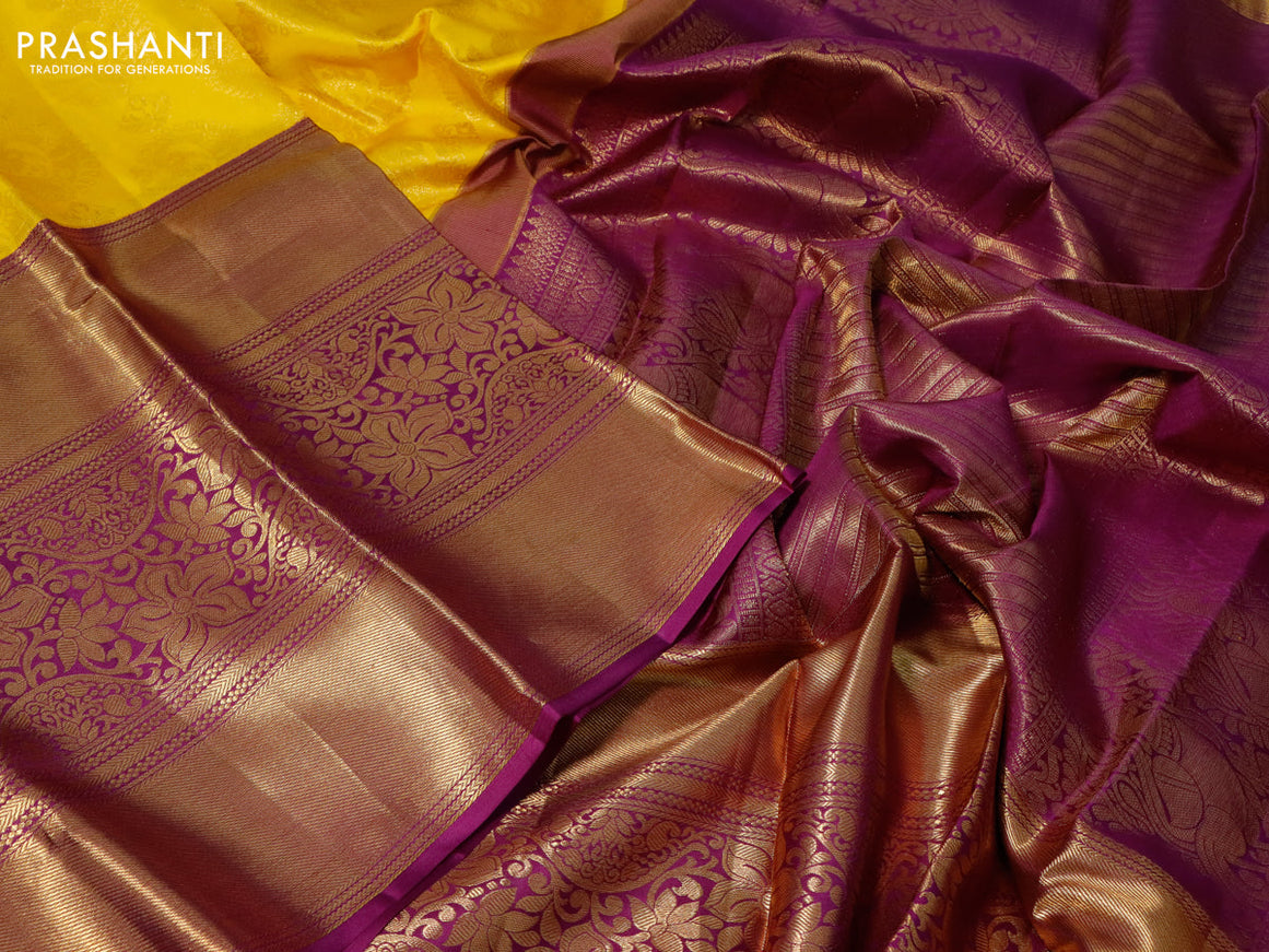 Pure kanchipuram silk saree yellow and purple with allover zari woven brocade weaves and long zari woven border