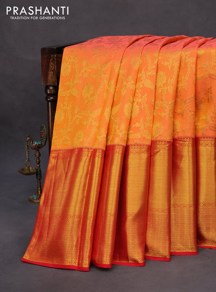 Pure kanchipuram silk saree dual shade of pinkish orange and red with allover zari woven brocade weaves and long zari woven border