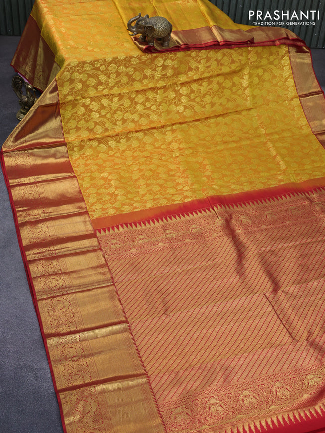 Pure kanchipuram silk saree mustard shade and red with allover zari woven brocade weaves and long zari woven border